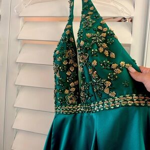 Women’s halter dress. With rhinestone top. Cosert on the back.